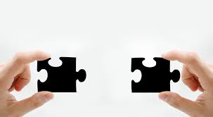 Become partner partnership symbol, two hands holding a jigsaw piece