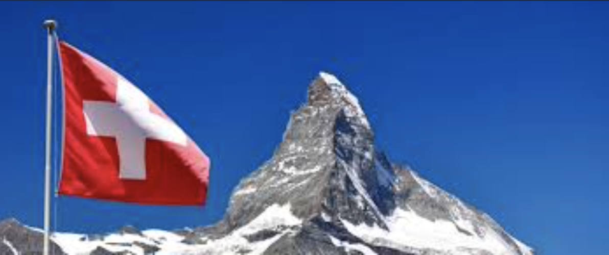 flag of switzerland and mountain